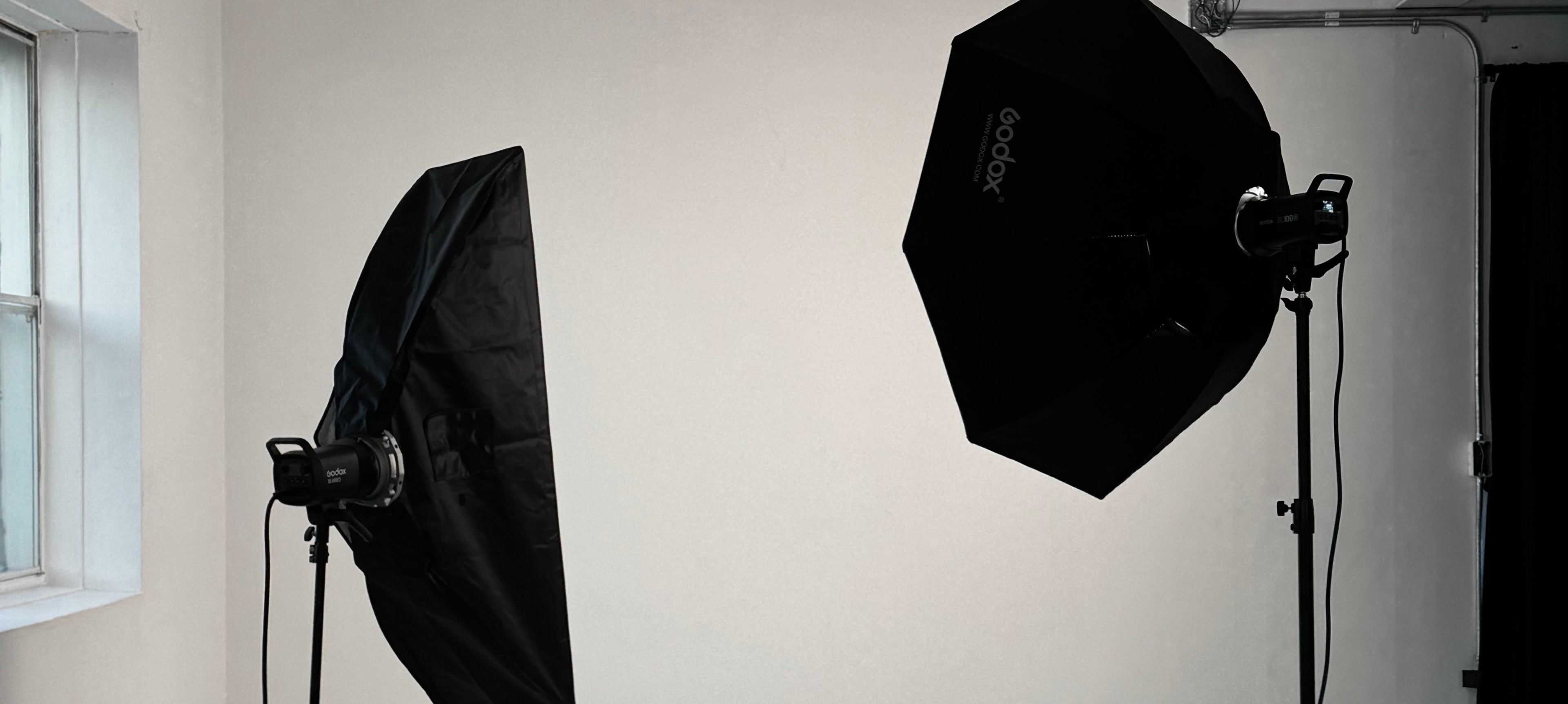 Studio setup with lighting equipment on a white background